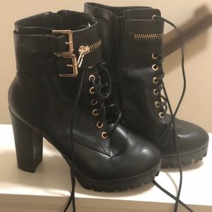 Gold buckle, black, heeled boots